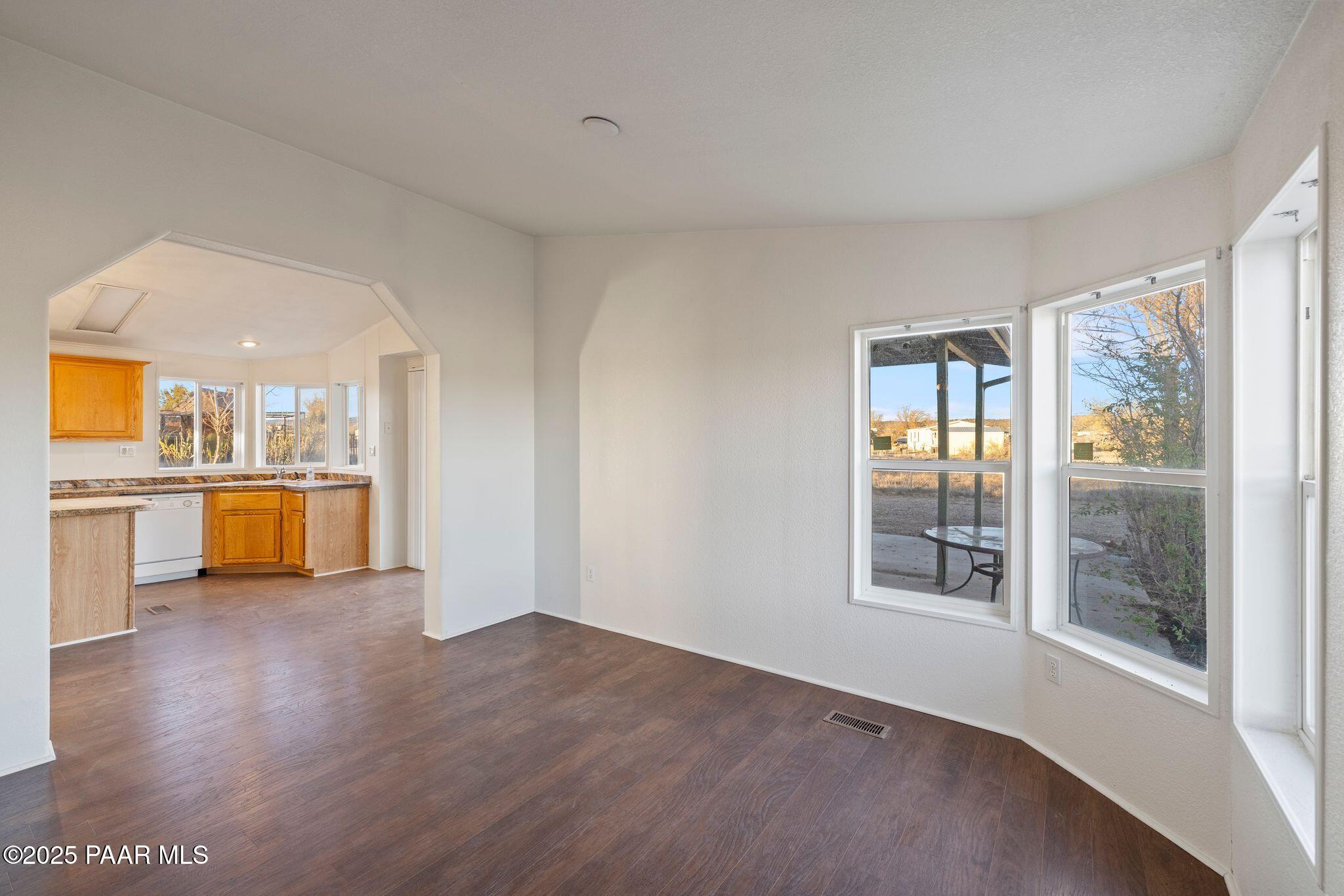 24580 North St Louis Street Paulden, AZ 86334 - Photo 6 of 26 a view of a kitchen with a sink dishwasher and a microwave oven