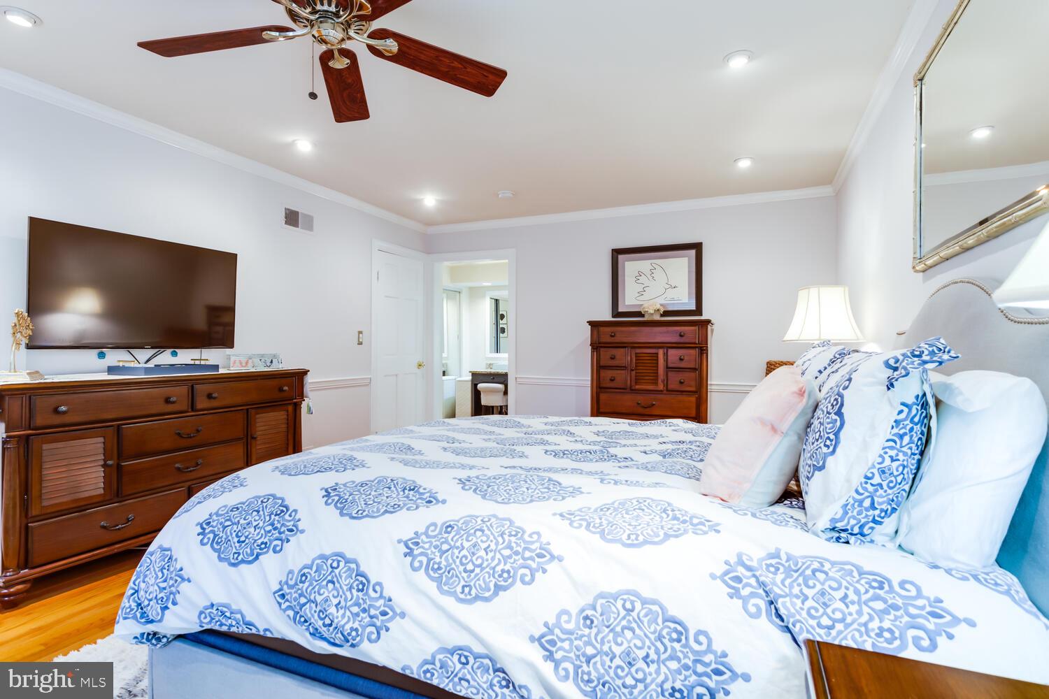 1704 Stonebridge Road Alexandria, VA 22304 - Photo 22 of 52 a bedroom with a bed and a flat screen tv