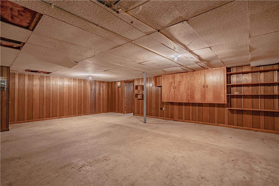 4815 Mill Road Schnecksville, PA 18078 - Photo 33 of 48 A utilitarian basement space offers ample storage with built-in cabinetry and shelving.