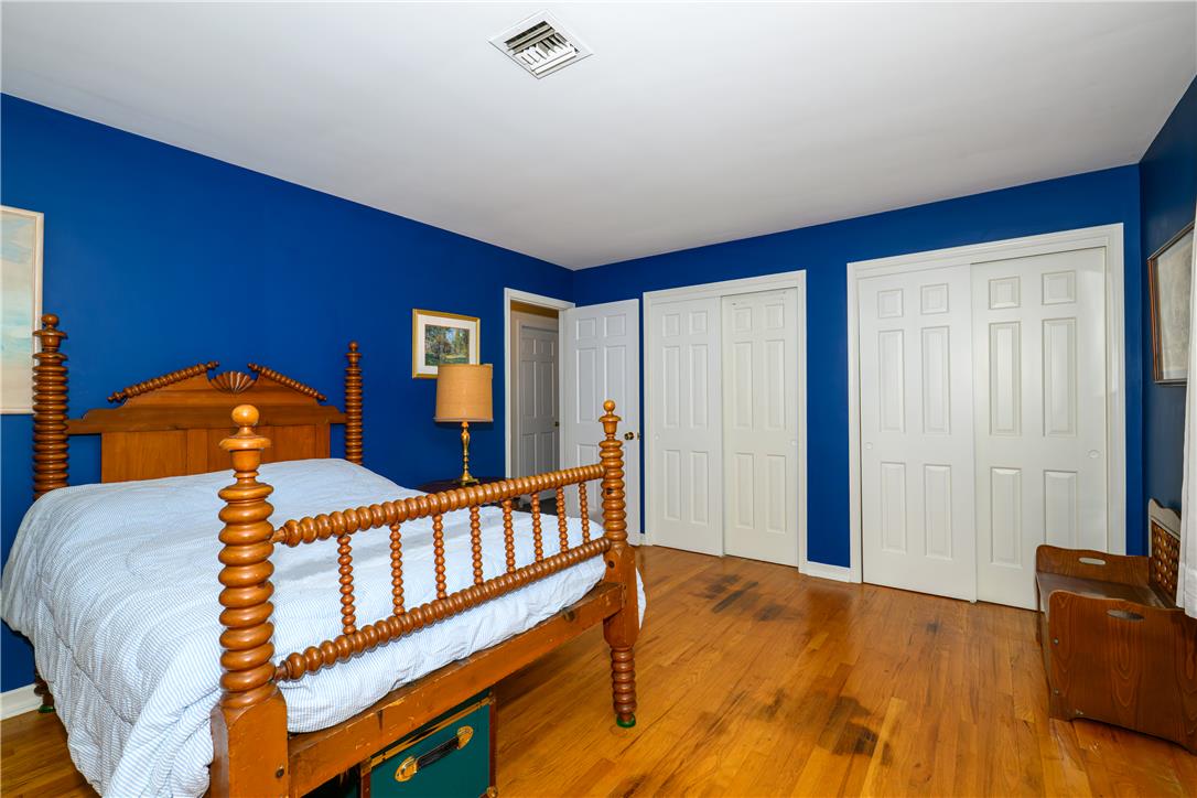 2516 Rachael Lane Orefield, PA 18069 - Photo 22 of 45 Hardwood floors and bright walls define this welcoming sleeping space.