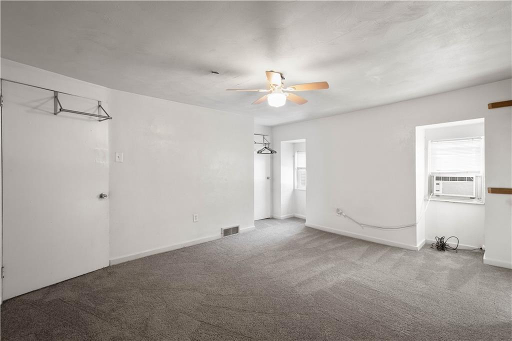108 Pius Street Pittsburgh, PA 15203 - Photo 28 of 36 a view of an empty room with a window