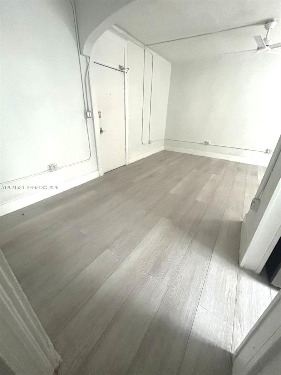 967 Southwest 5th Street, Unit 10 Miami, FL 33130 - Photo 3 of 9 a view of an empty room