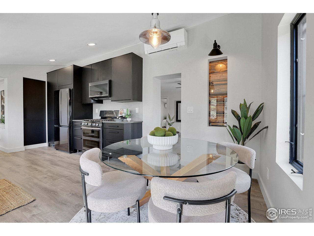 281 County Road 83 Boulder, CO 80302 - Photo 11 of 31 a kitchen with a table and chairs in it