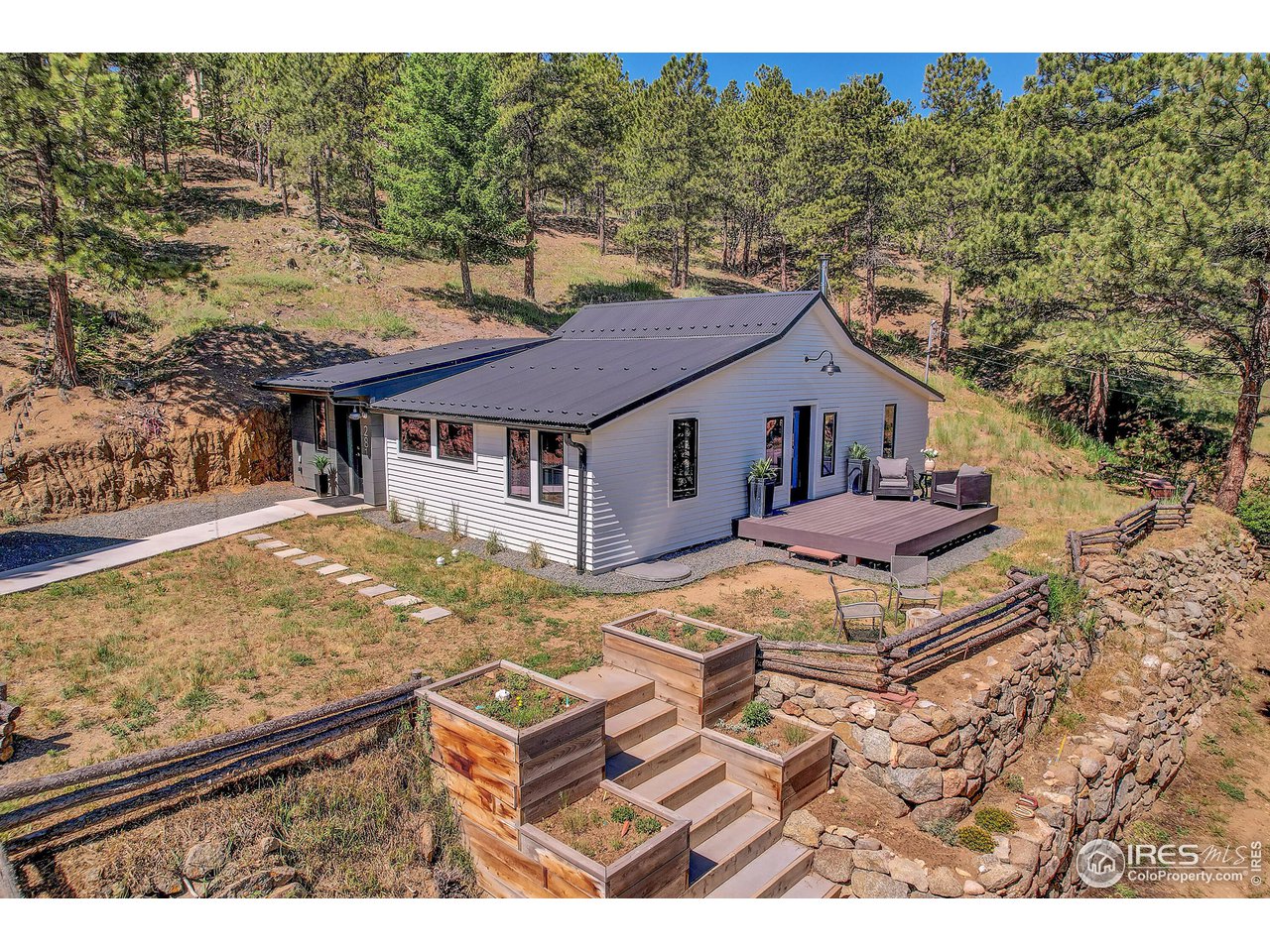281 County Road 83 Boulder, CO 80302 - Photo 2 of 31 a aerial view of a house with large trees