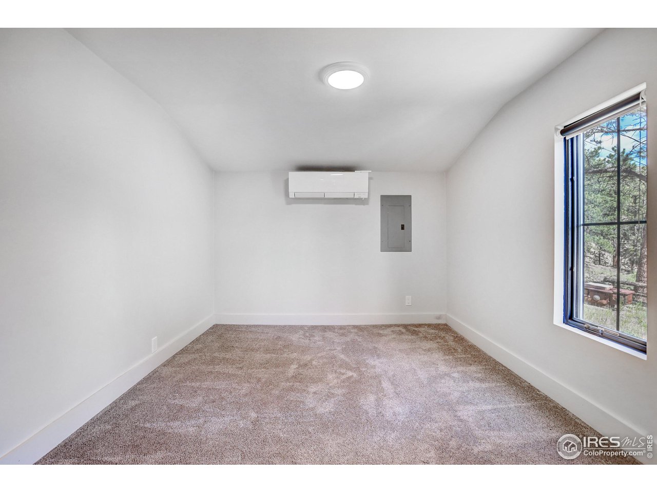 281 County Road 83 Boulder, CO 80302 - Photo 22 of 31 a view of an empty room and window