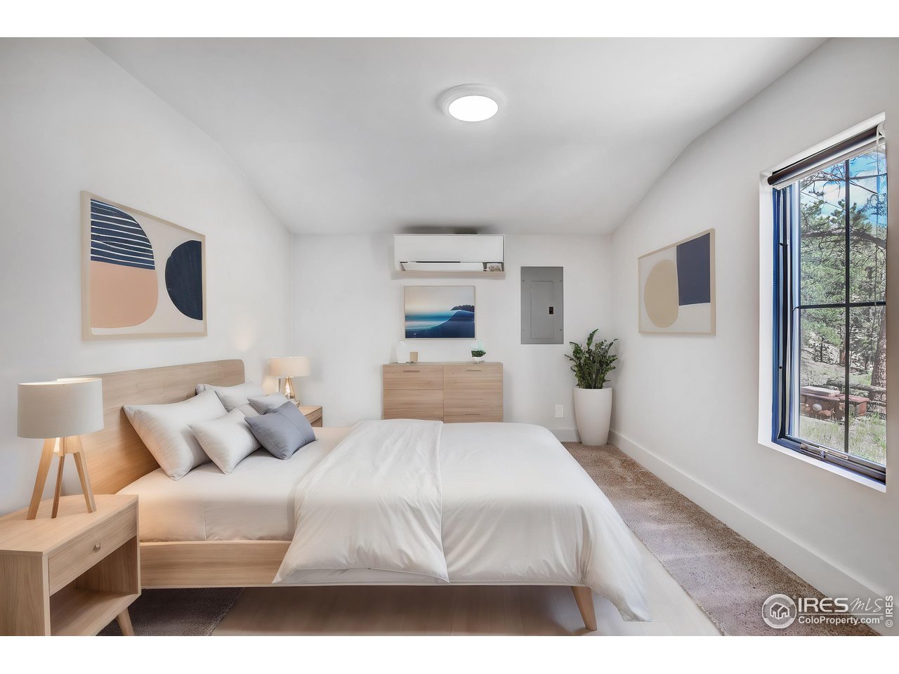 281 County Road 83 Boulder, CO 80302 - Photo 23 of 31 a bedroom with a large bed and a window