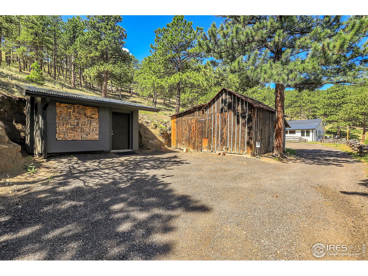 281 County Road 83 Boulder, CO 80302 - Photo 24 of 31 a view of a wooden house with a street sign