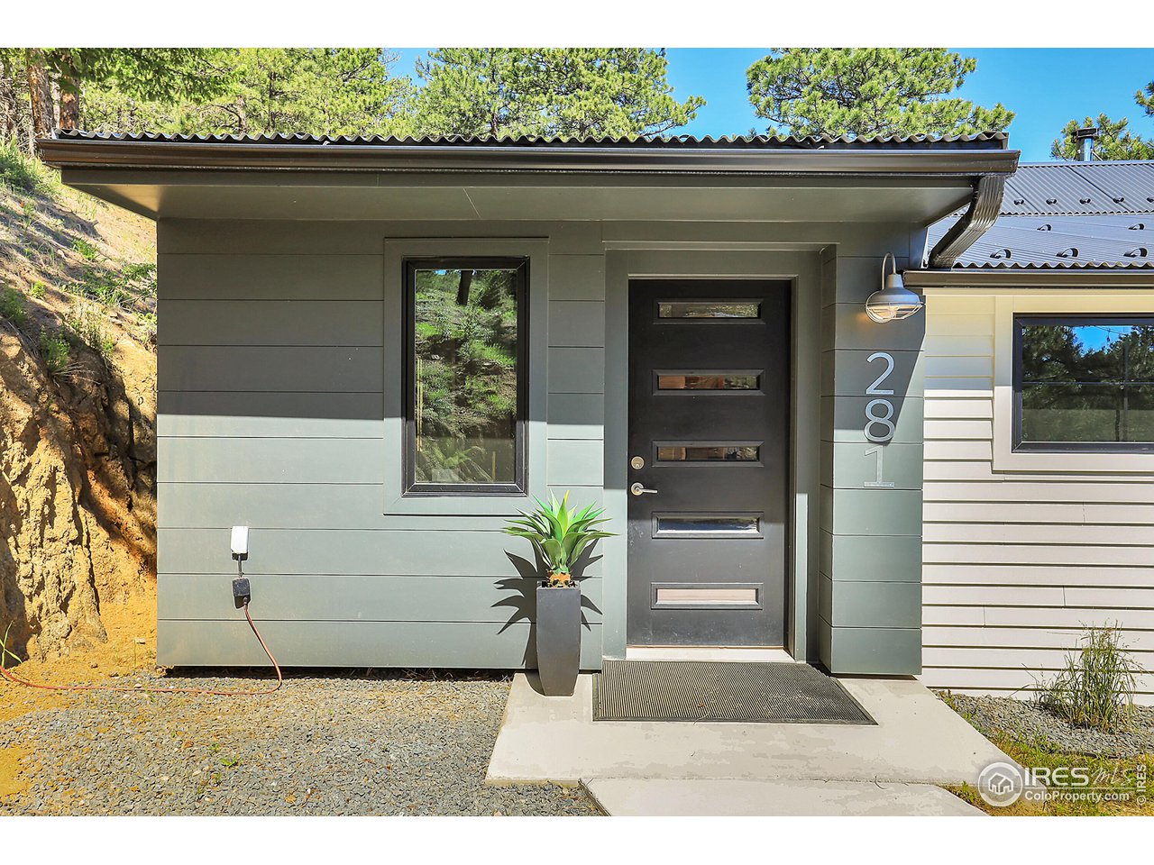 281 County Road 83 Boulder, CO 80302 - Photo 4 of 31 a black and white photo of a house