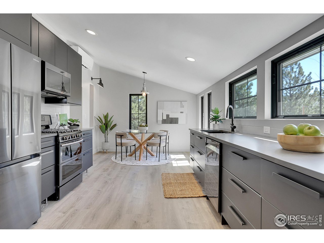 281 County Road 83 Boulder, CO 80302 - Photo 6 of 31 a kitchen with stainless steel appliances granite countertop a refrigerator a sink a stove and a center island