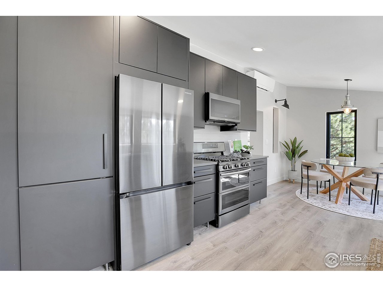281 County Road 83 Boulder, CO 80302 - Photo 7 of 31 a kitchen with kitchen island a counter top space stainless steel appliances and cabinets