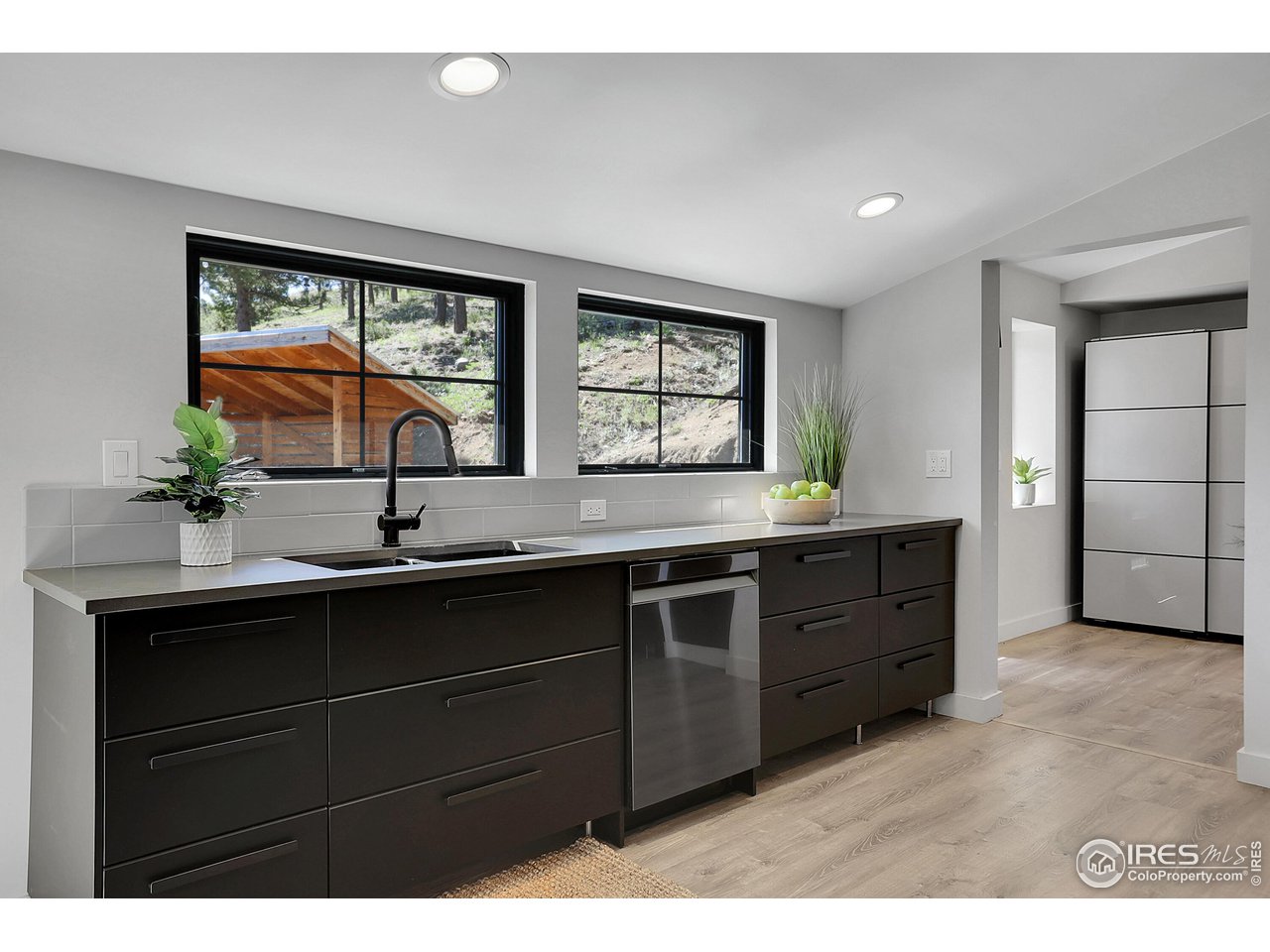 281 County Road 83 Boulder, CO 80302 - Photo 8 of 31 a kitchen with a sink and large window