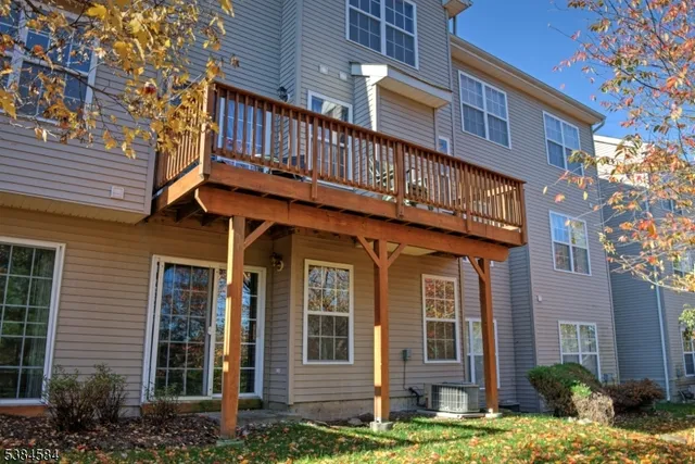 a view of a building with a yard