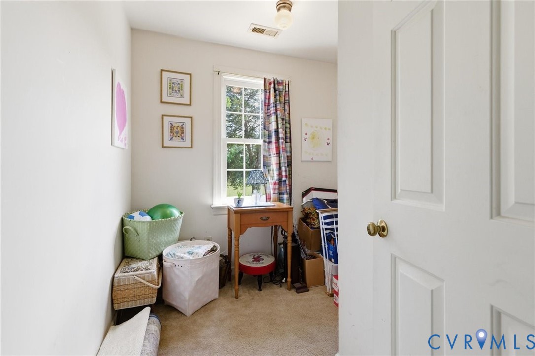 15414 Sunnybrook Road Petersburg, VA 23805 - Photo 21 of 29 a living room with furniture and a window