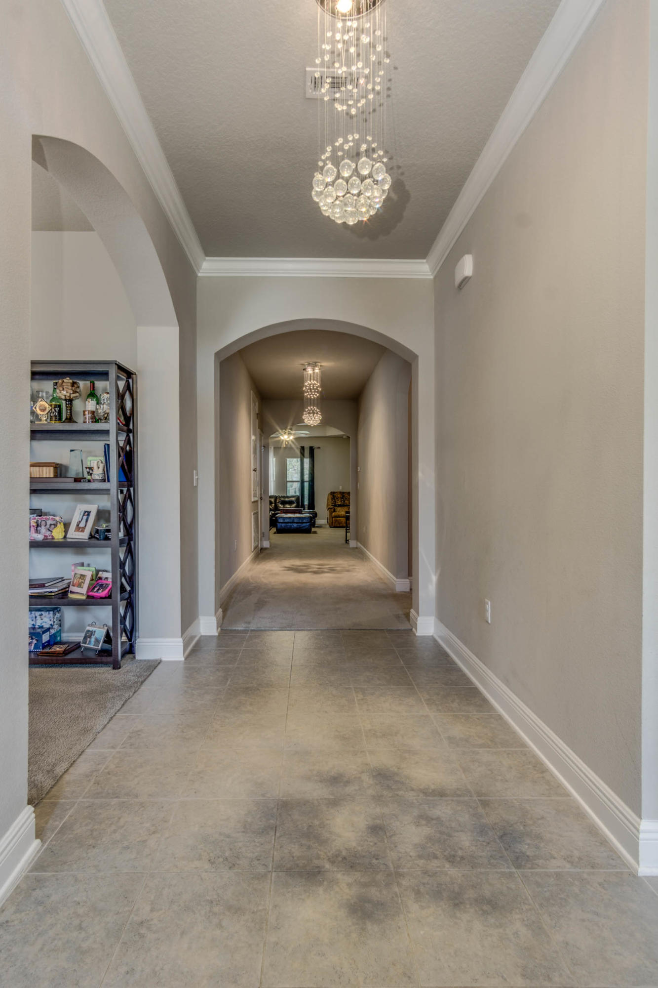 644 Red Fern Road Crestview, FL 32536 - Photo 13 of 46 a view of a hallway with a bedroom