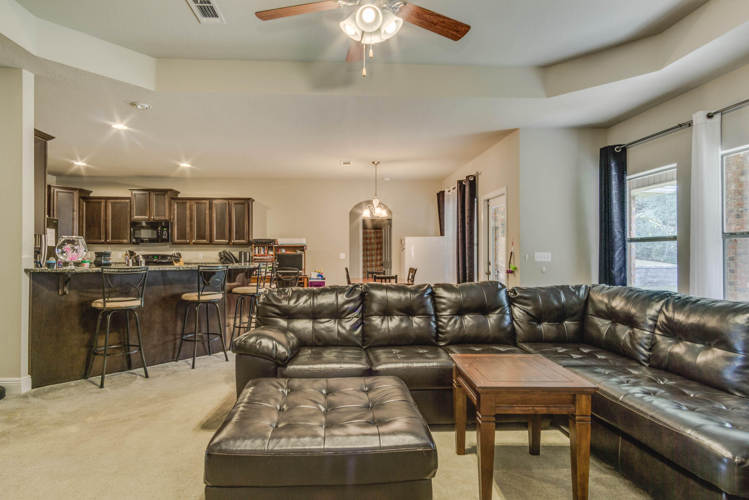 644 Red Fern Road Crestview, FL 32536 - Photo 17 of 46 a living room with furniture and a large window