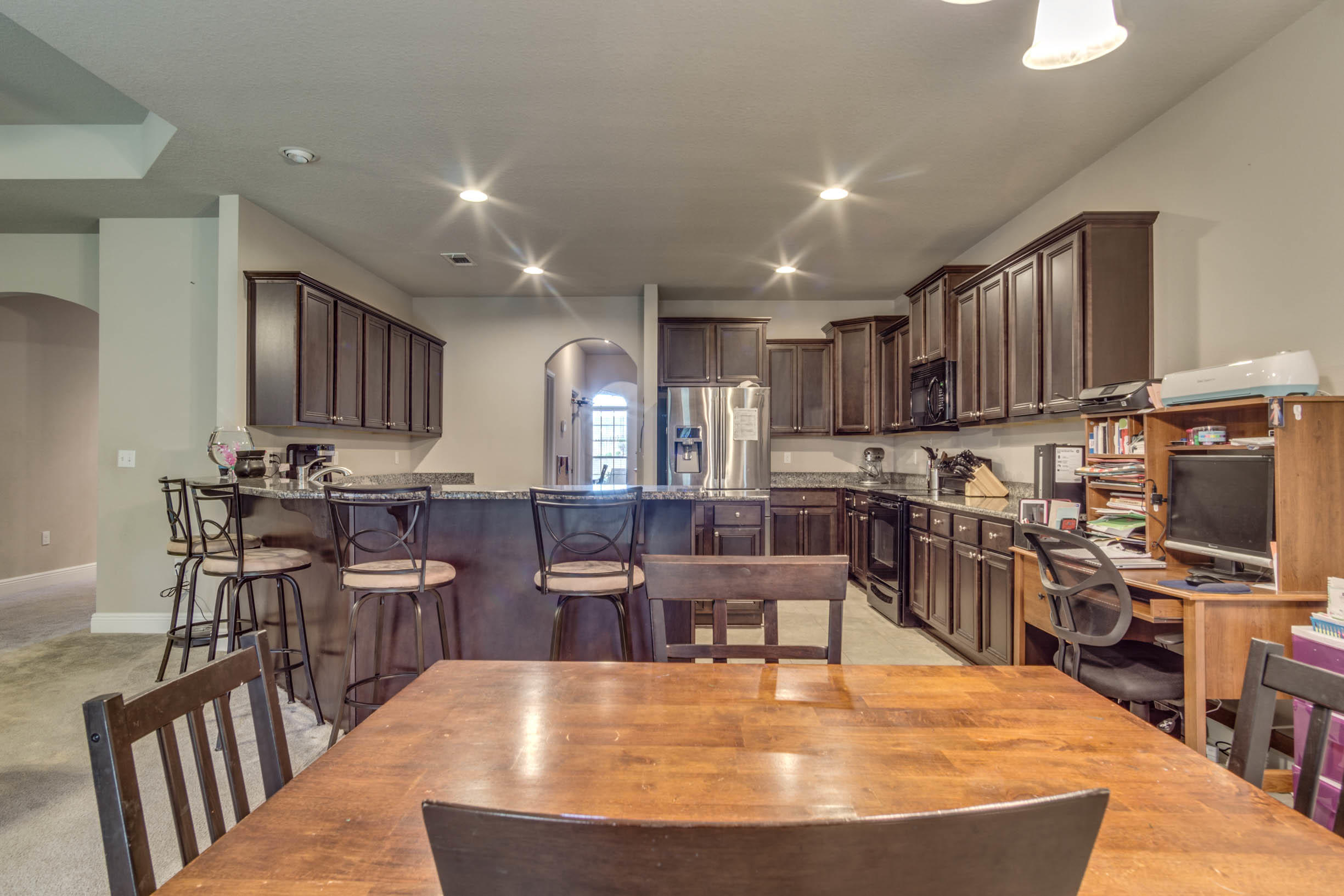 644 Red Fern Road Crestview, FL 32536 - Photo 20 of 46 a large kitchen with lots of counter space and windows