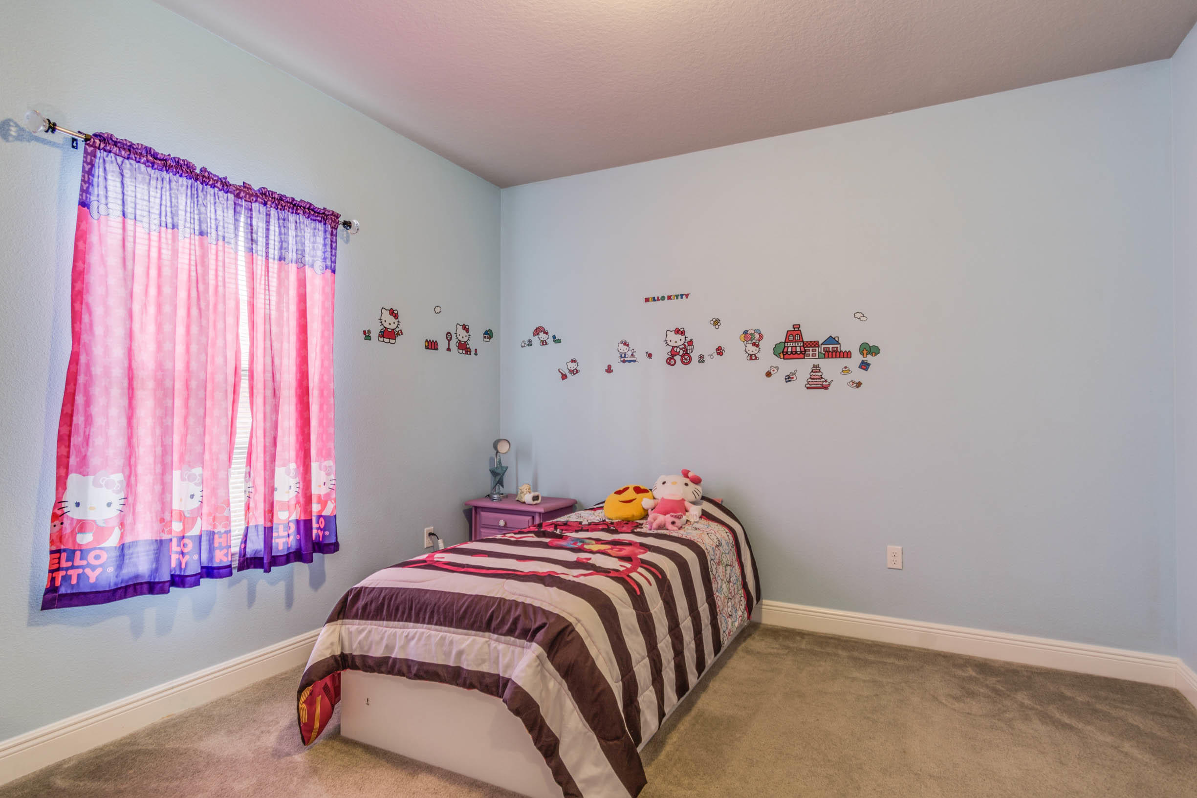 644 Red Fern Road Crestview, FL 32536 - Photo 30 of 46 a bedroom with a bed and a window
