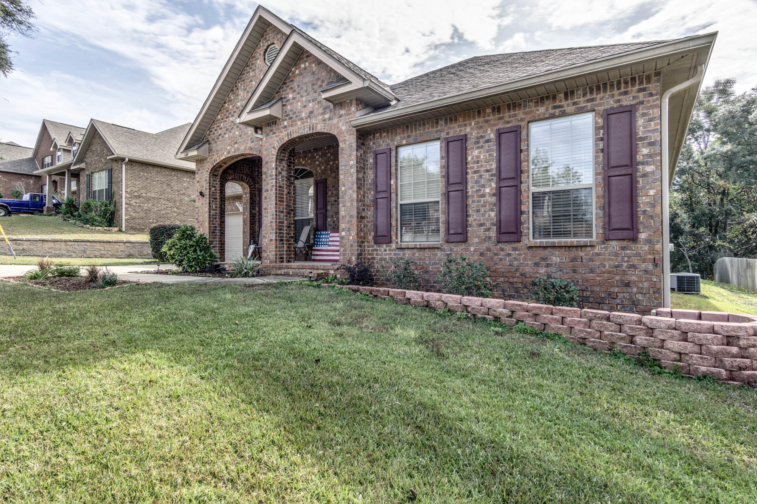 644 Red Fern Road Crestview, FL 32536 - Photo 4 of 46 a front view of a house with a yard