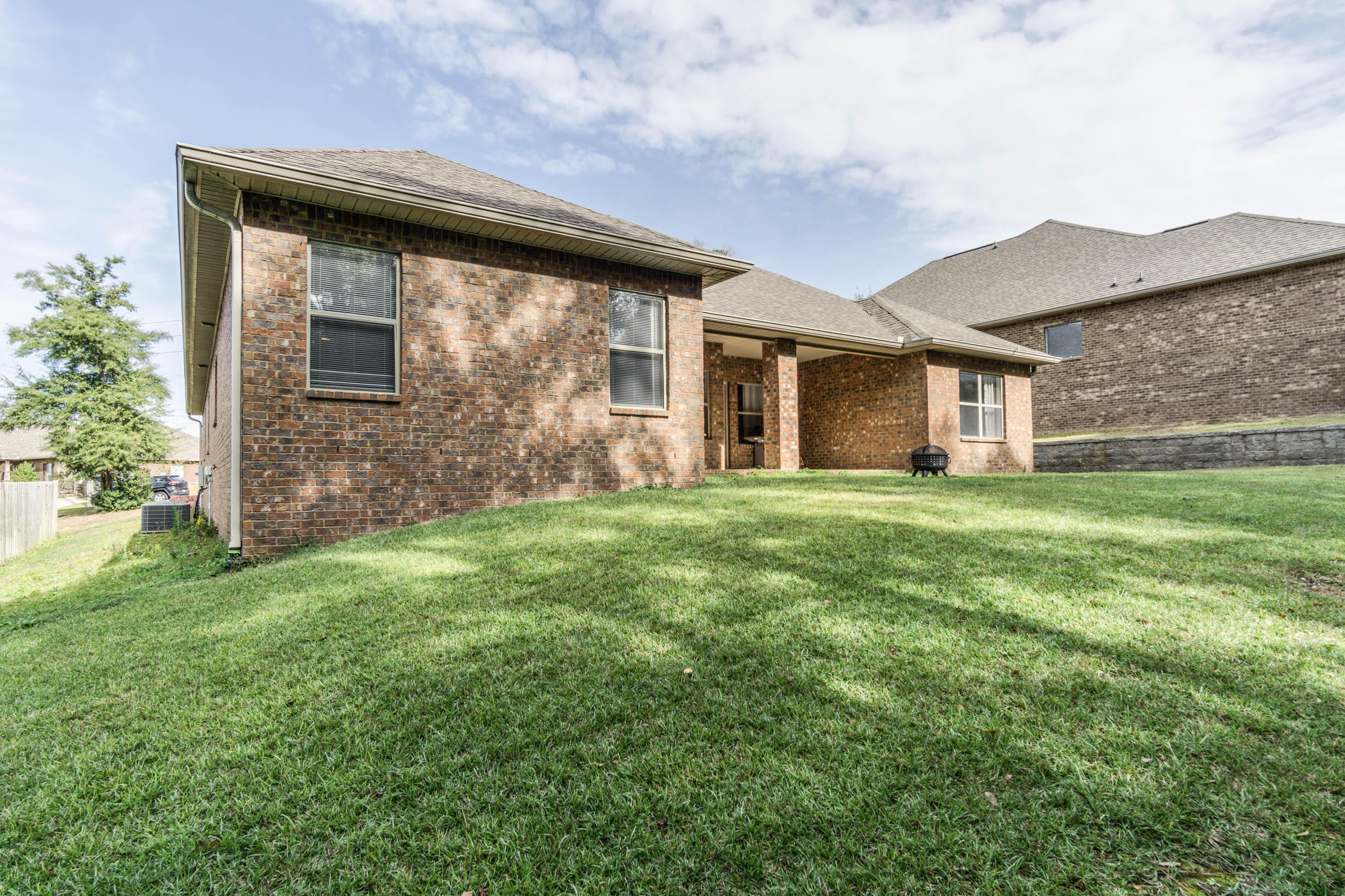 644 Red Fern Road Crestview, FL 32536 - Photo 45 of 46 a view of a house with yard and a garden