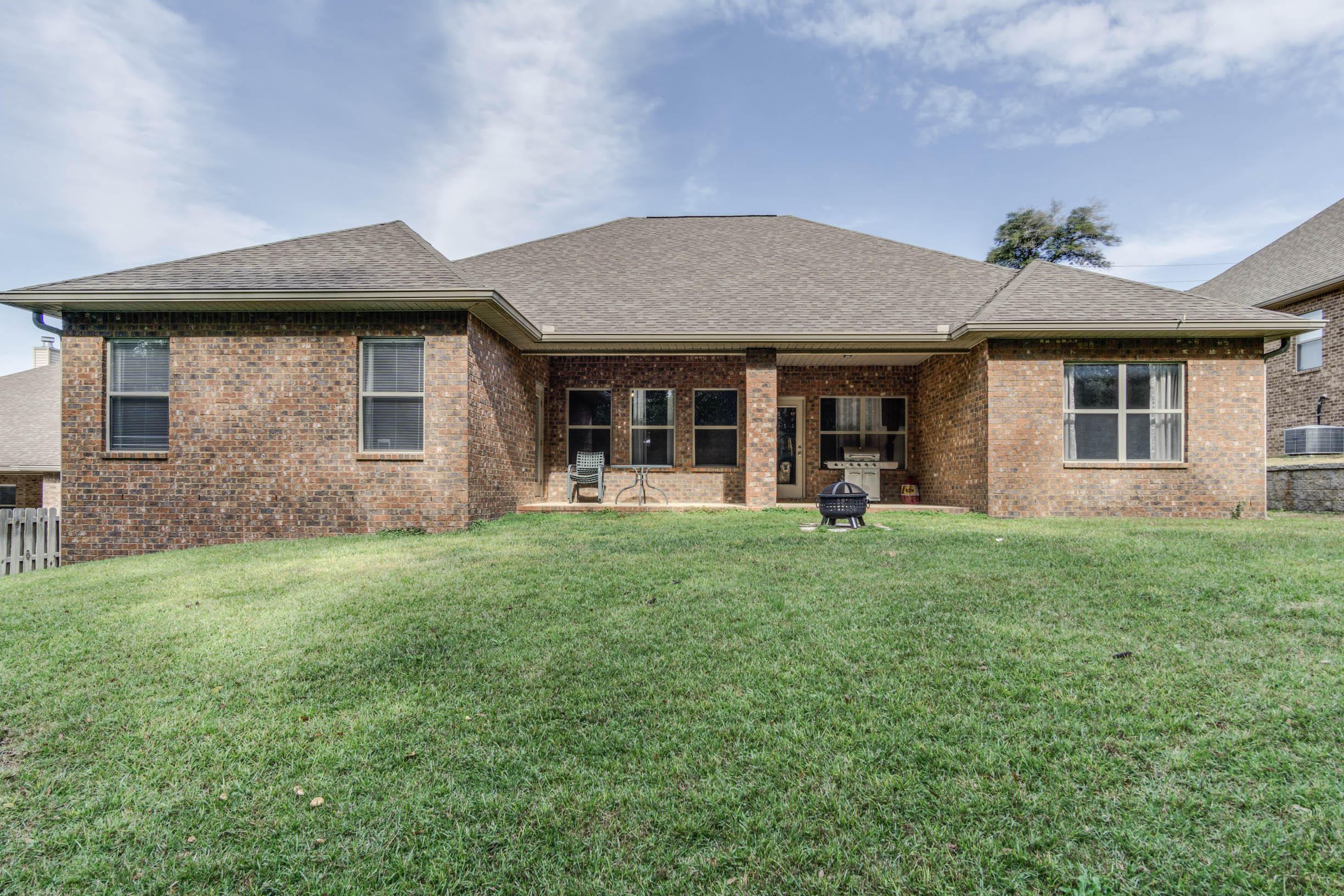 644 Red Fern Road Crestview, FL 32536 - Photo 46 of 46 a front view of a house with a yard and garage