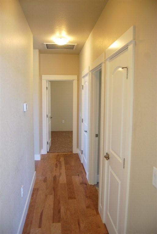 1117 Boulder Ridge Street Central Point, OR 97502 - Photo 16 of 19 a view of a bathroom from a hallway
