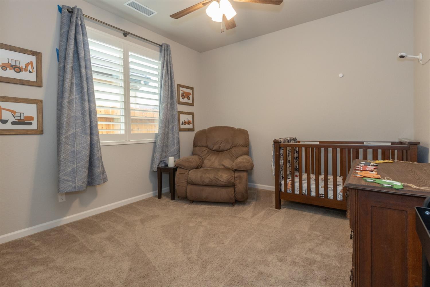 1063 Soledad Avenue Clovis, CA 93619 - Photo 20 of 26 a bedroom with furniture and a window
