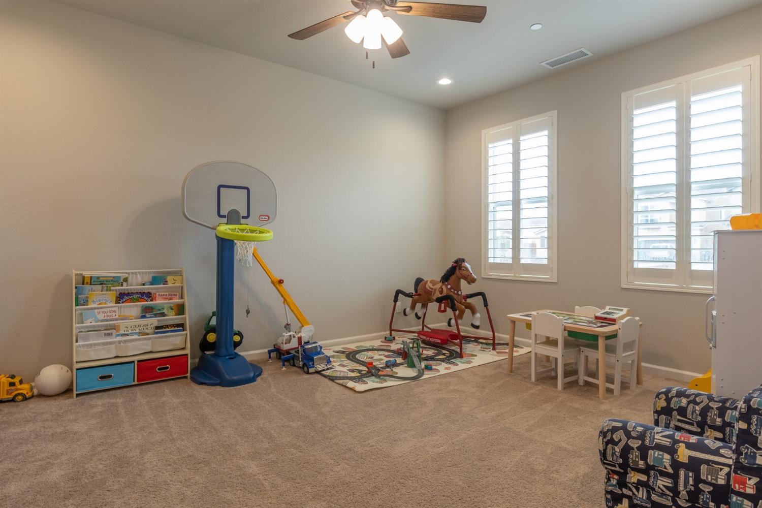 1063 Soledad Avenue Clovis, CA 93619 - Photo 22 of 26 a view of a room with gym equipment