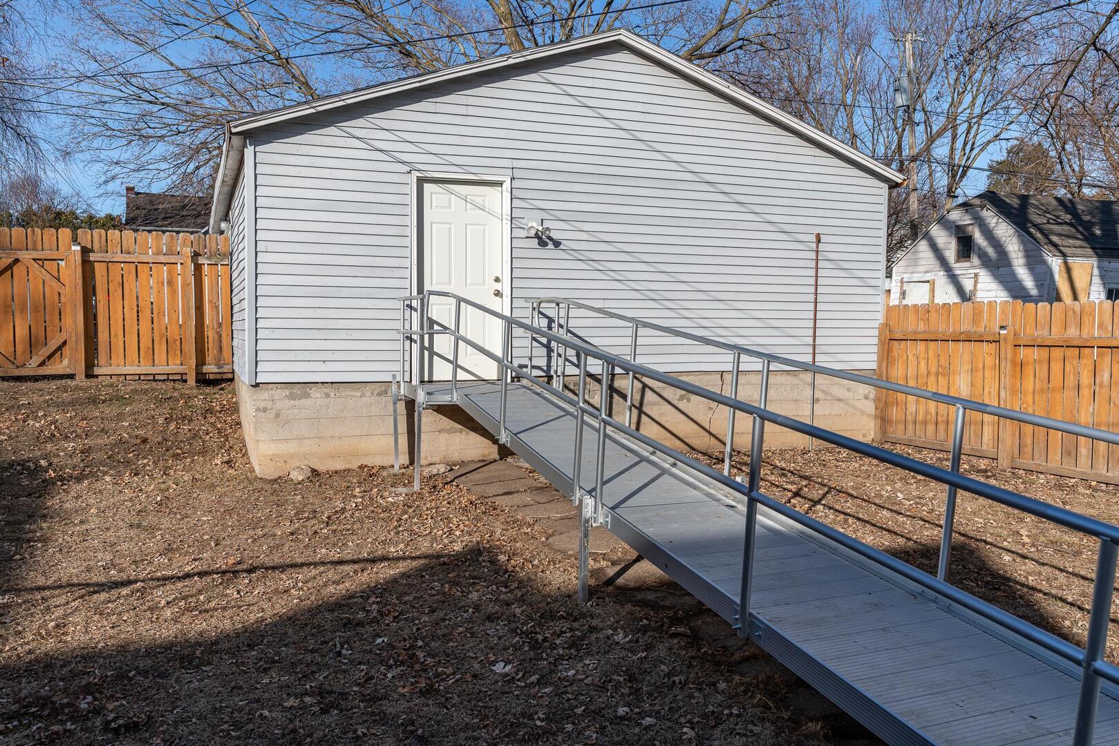 1708 Pershing Boulevard Clinton, IA 52732 - Photo 18 of 18 a view of a house with a small deck