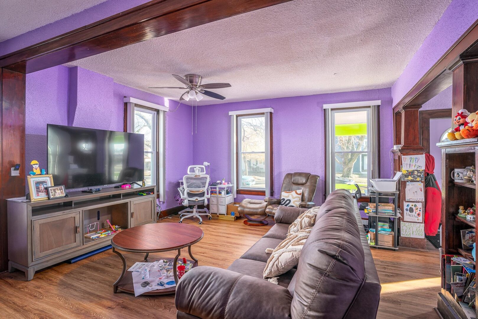 1708 Pershing Boulevard Clinton, IA 52732 - Photo 4 of 18 a living room with furniture and a flat screen tv