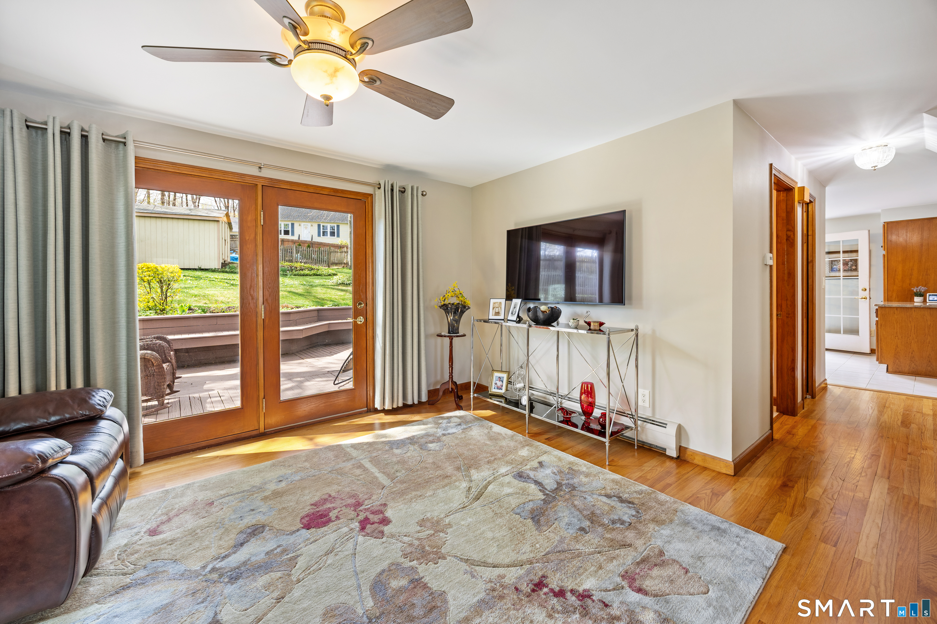 42 Chimney Sweep Road Wallingford, CT 06492 - Photo 17 of 40 a bedroom with furniture and flat screen tv
