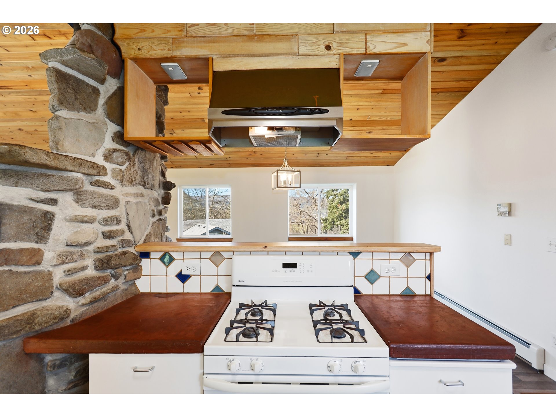 1707 Bridge Street The Dalles, OR 97058 - Photo 12 of 41 a view of a dinning tables and chair in the patio