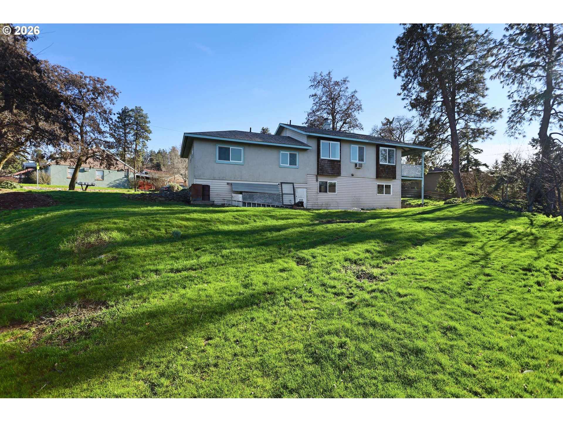 1707 Bridge Street The Dalles, OR 97058 - Photo 34 of 41 a view of a house with a back yard