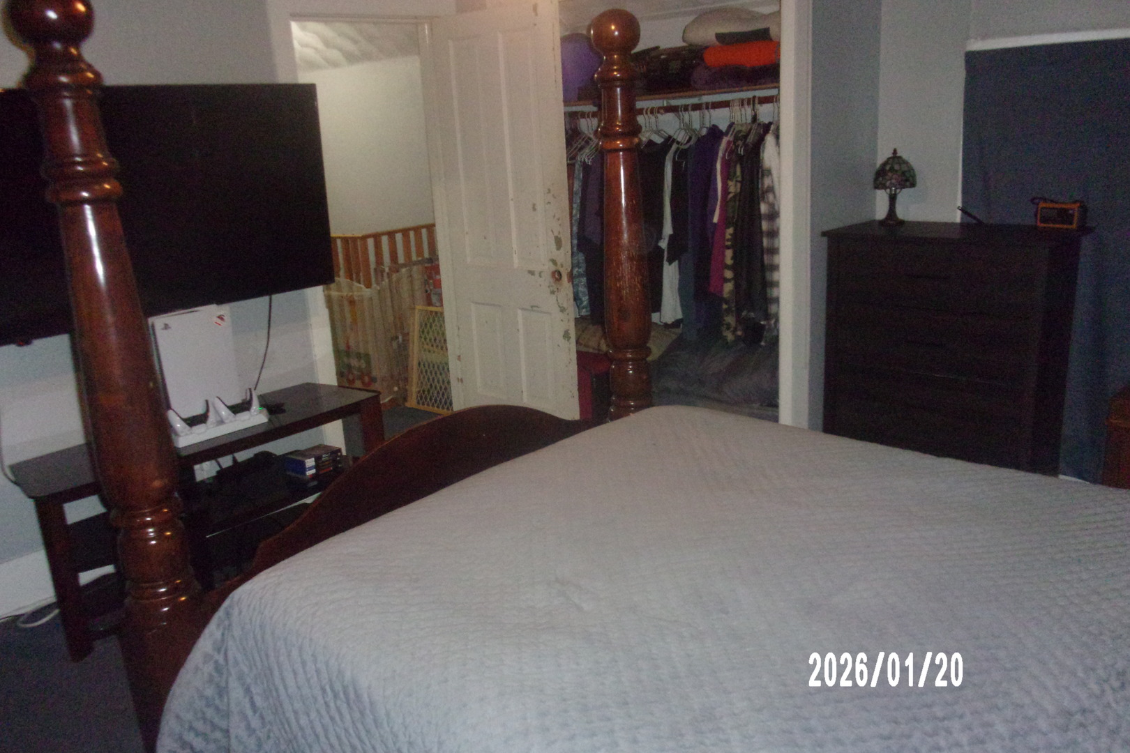 205 South Axtel Street Milford, IL 60953 - Photo 14 of 15 a bedroom with a bed and a mirror