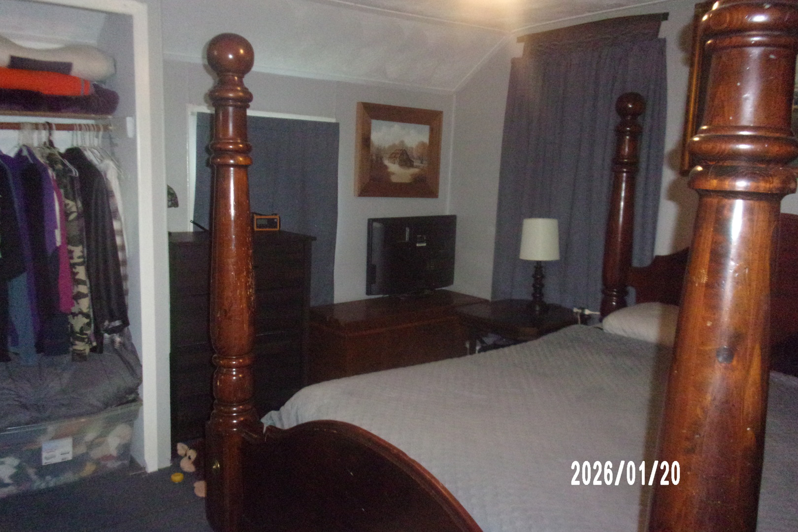 205 South Axtel Street Milford, IL 60953 - Photo 15 of 15 a bedroom with a bed and a chandelier