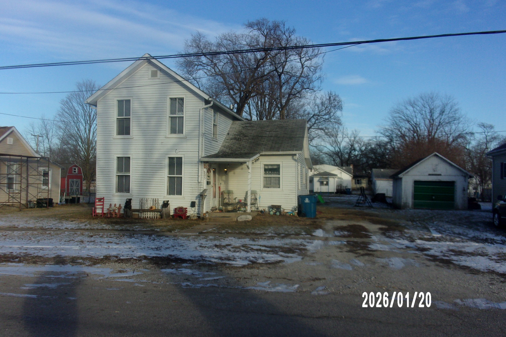 205 South Axtel Street Milford, IL 60953 - Photo 4 of 15 a front view of a house with a yard
