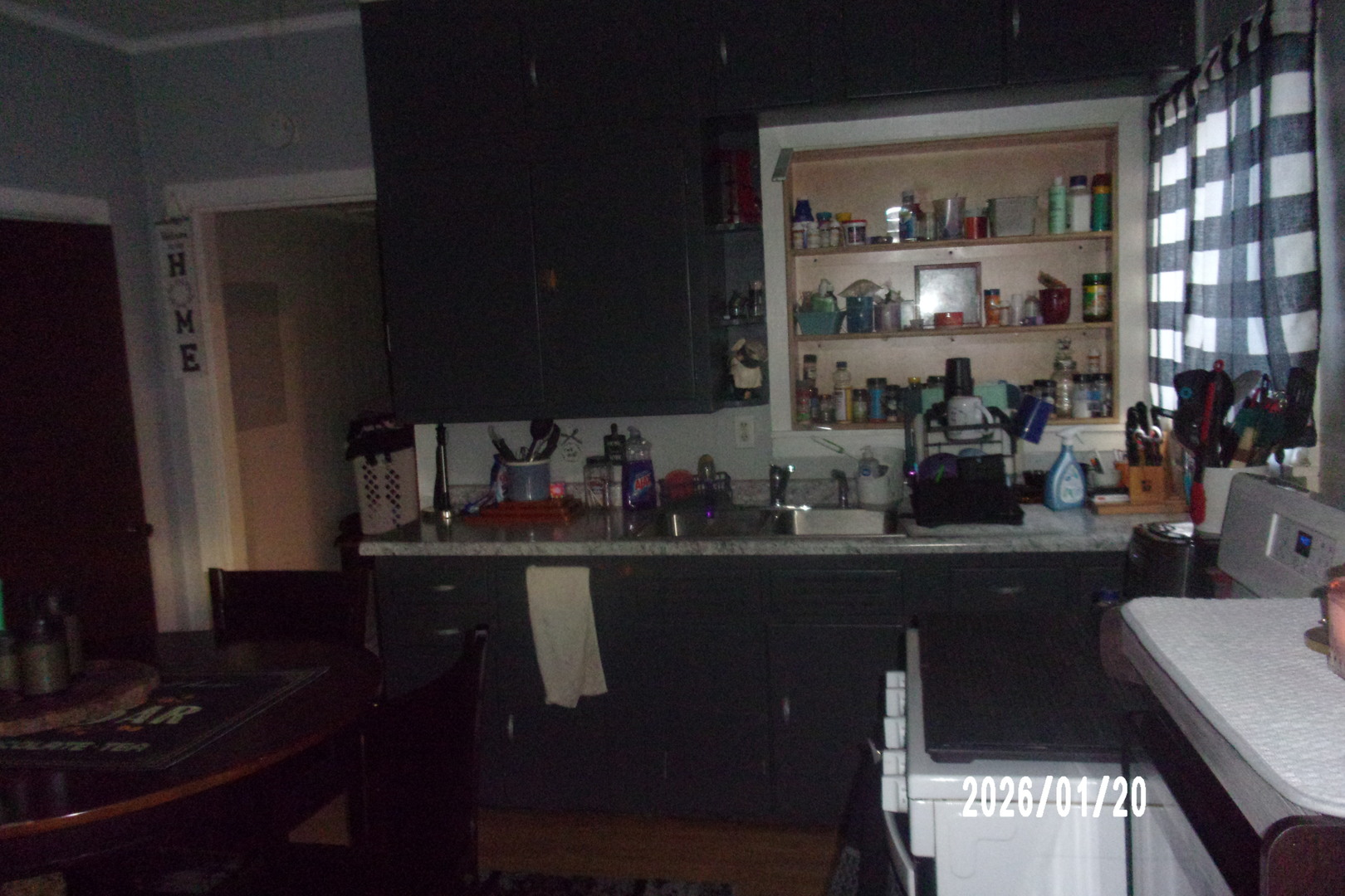 205 South Axtel Street Milford, IL 60953 - Photo 8 of 15 a kitchen with a sink and cabinets