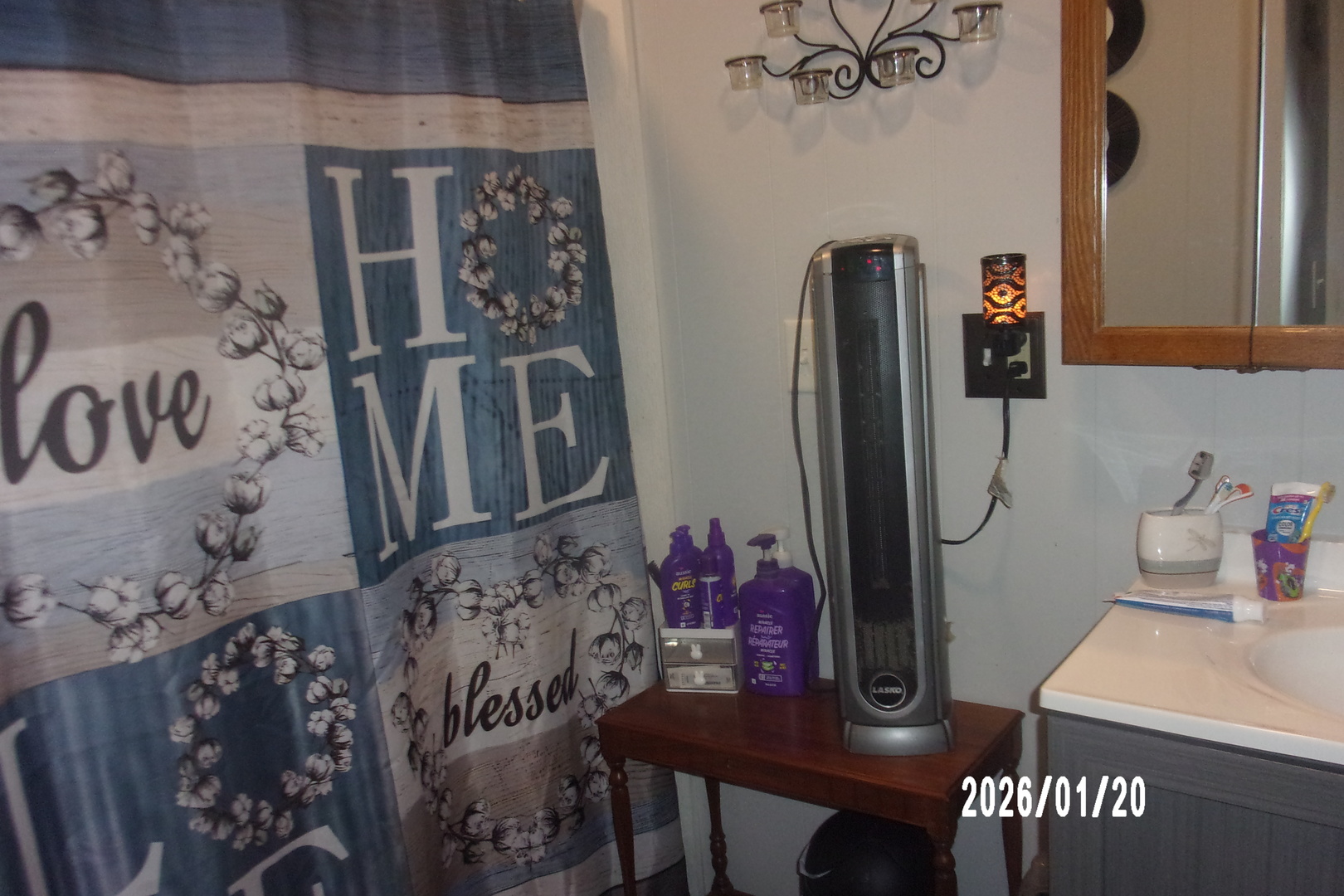 205 South Axtel Street Milford, IL 60953 - Photo 10 of 15 a bathroom with a sink and a mirror