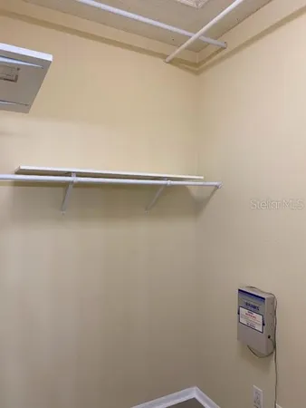a view of a room with racks on the wall