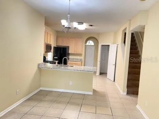 a view of a kitchen with a sink and dishwasher kitchen view