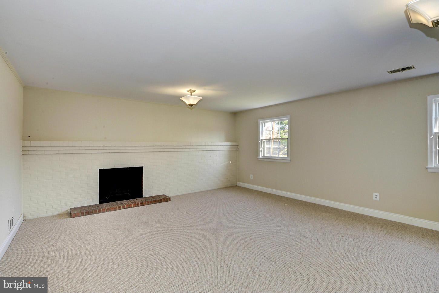2701 Woodedge Road Silver Spring, MD 20906 - Photo 18 of 27 a view of an empty room with a window