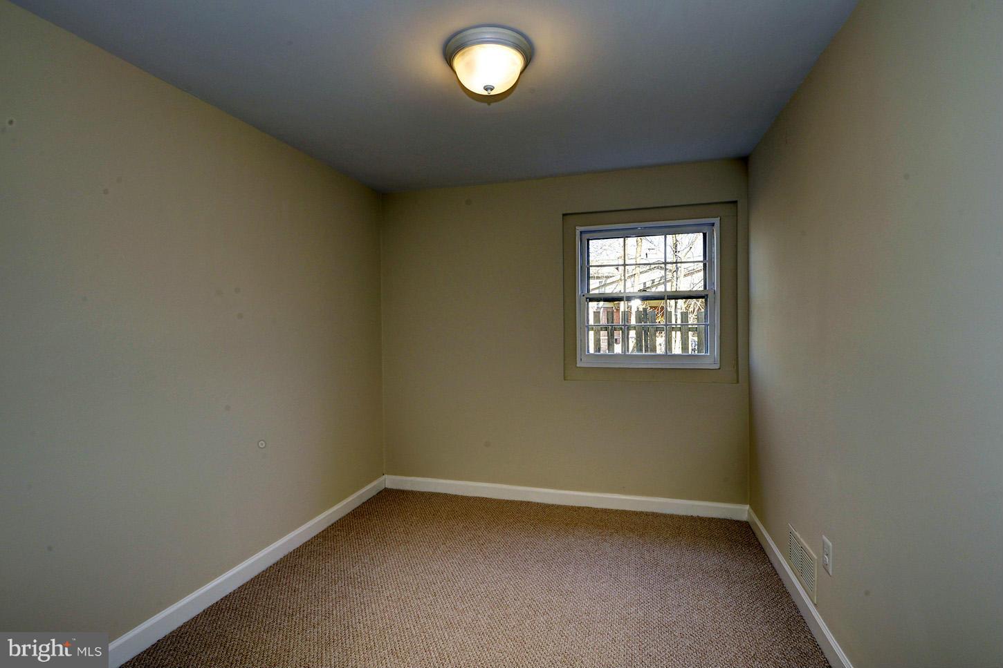 2701 Woodedge Road Silver Spring, MD 20906 - Photo 20 of 27 an empty room with a window