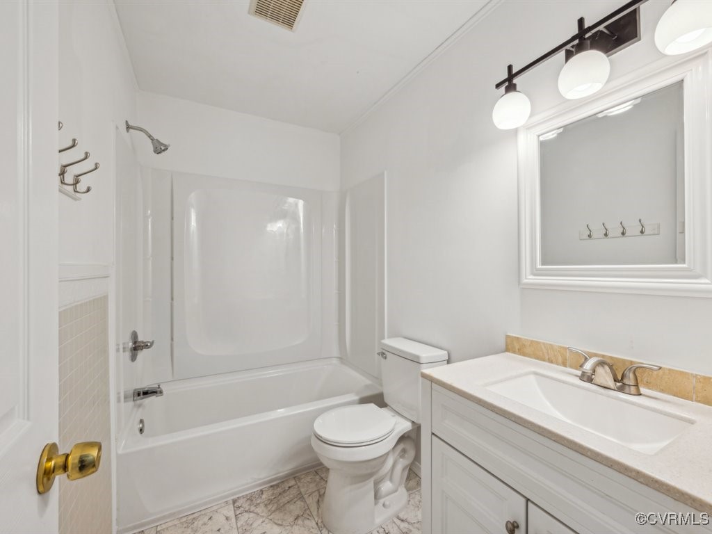 1407 Oldbury Road Midlothian, VA 23113 - Photo 12 of 34 a bathroom with a sink a toilet and shower