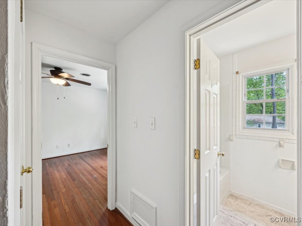 1407 Oldbury Road Midlothian, VA 23113 - Photo 17 of 34 a view of a hallway with wooden floor and closet