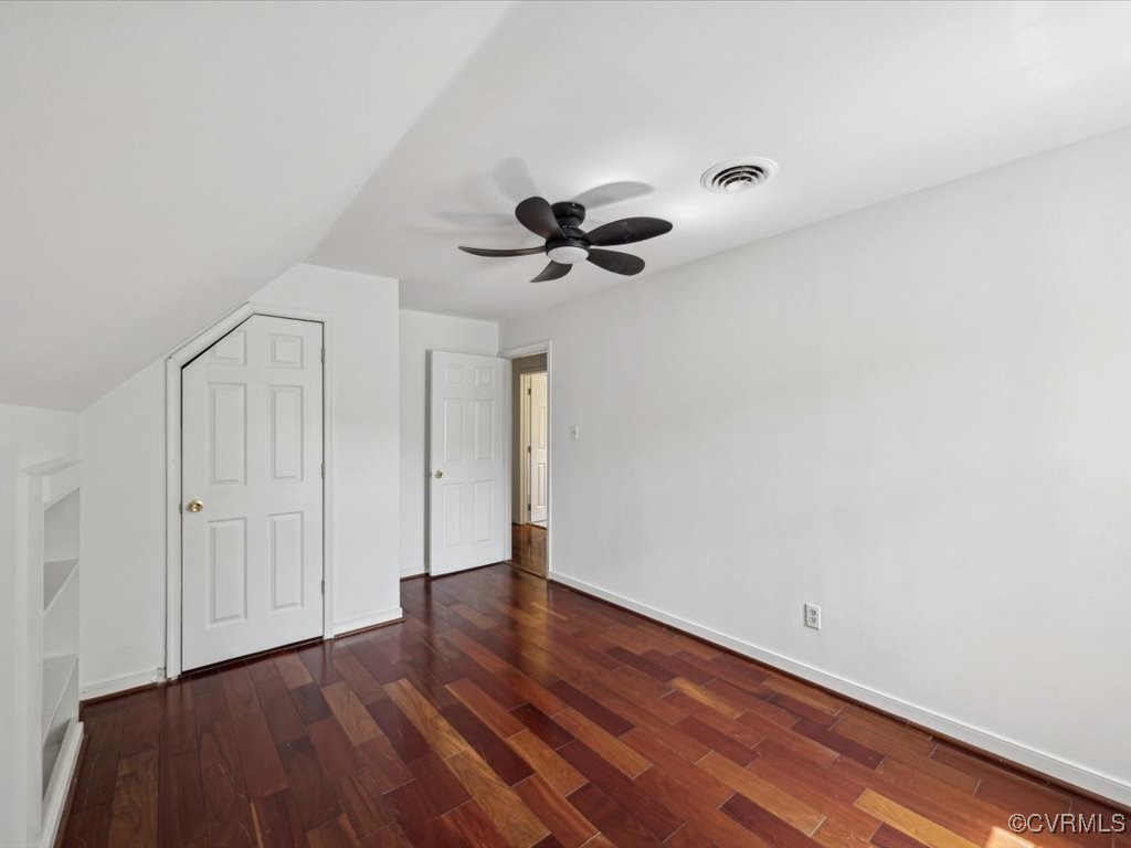 1407 Oldbury Road Midlothian, VA 23113 - Photo 18 of 34 a view of a room with wooden floor and a ceiling fan