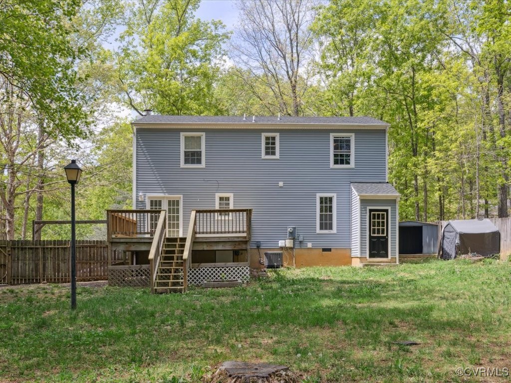 1407 Oldbury Road Midlothian, VA 23113 - Photo 24 of 34 a view of a house with a backyard