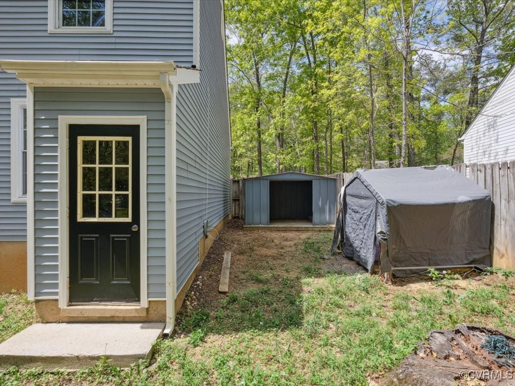 1407 Oldbury Road Midlothian, VA 23113 - Photo 25 of 34 a view of a backyard of the house