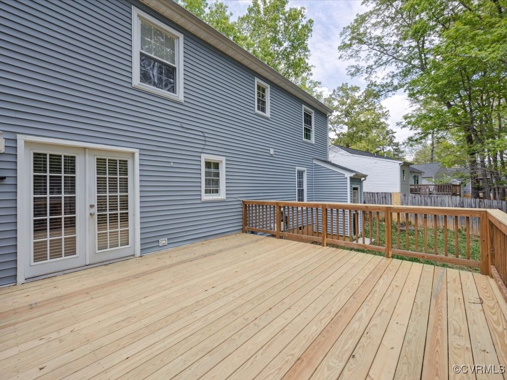 1407 Oldbury Road Midlothian, VA 23113 - Photo 28 of 34 a view of backyard with deck and wooden floor