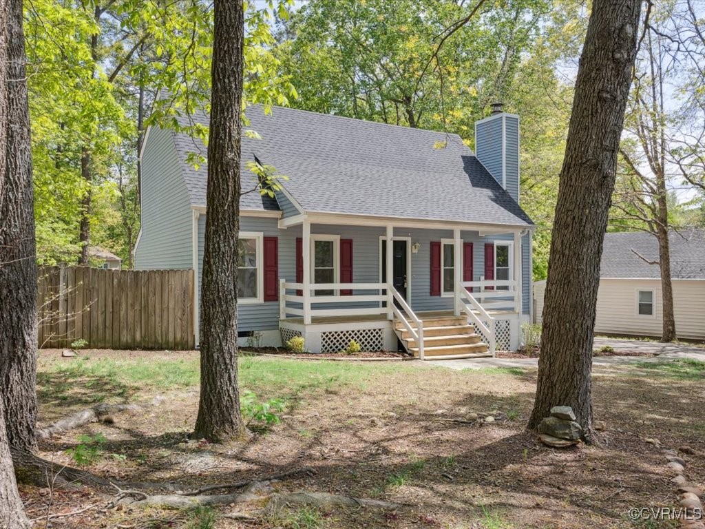 1407 Oldbury Road Midlothian, VA 23113 - Photo 3 of 34 a front view of a house with a yard