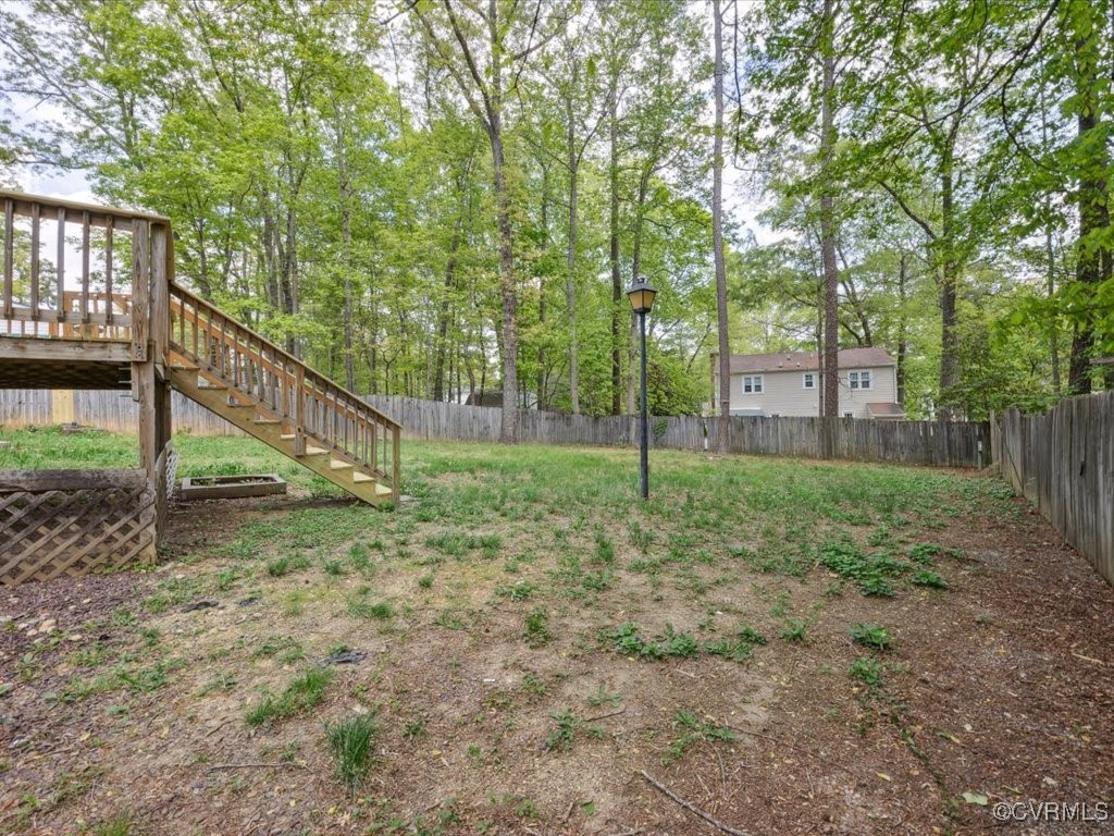 1407 Oldbury Road Midlothian, VA 23113 - Photo 31 of 34 a view of a yard with a tiny play house