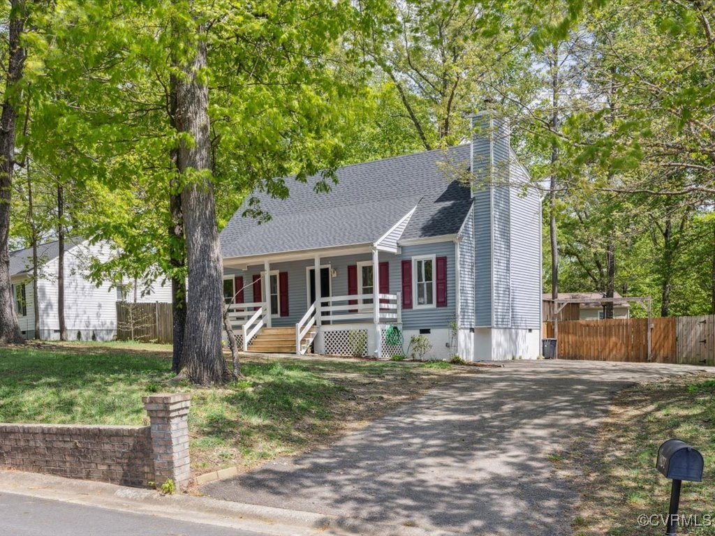 1407 Oldbury Road Midlothian, VA 23113 - Photo 4 of 34 a front view of a house with garden